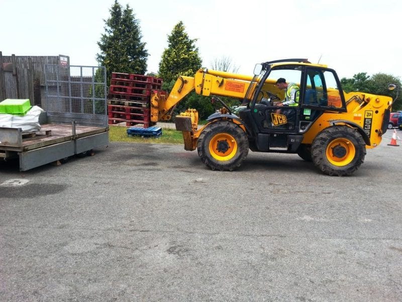 Loading a trailer during Telescopic Handler training at Providence.